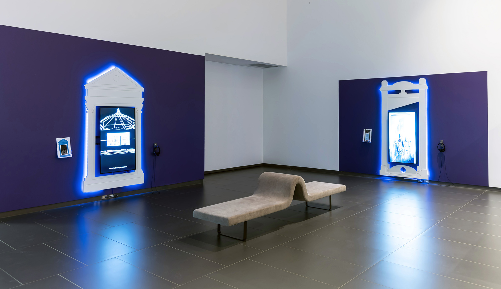 Installation view at Art Gallery of Grande Prairie showing Gameworkers and Guildworkers and Blindspot as single-channel machinima video installations.