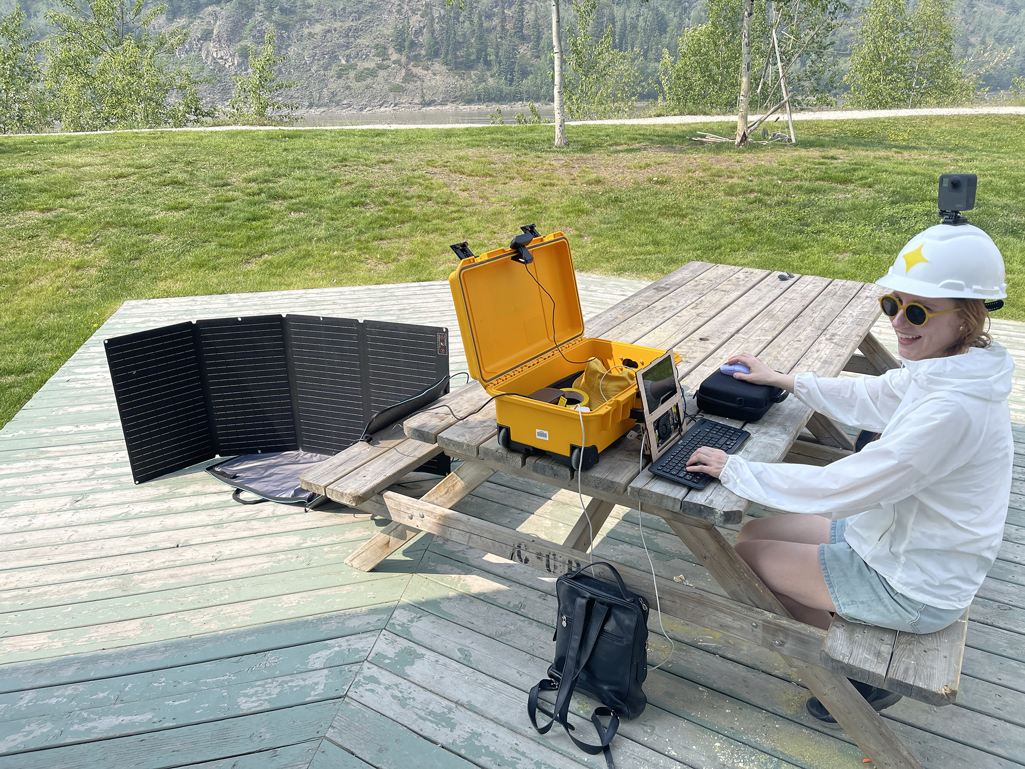 The artist operating a slimmed-down portable version of the WaGAN outdoors at the Klondike Institute of Art and Culture.